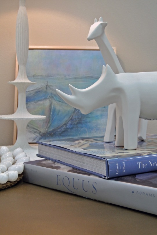 A ceramic giraffe or rhino for the animal lover in the family? Only $31.25 each!